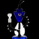 Blue and black glass water pipe (rig) with intricate design and quartz banger.