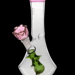 Glass bong shaped like a flower with pink accents.