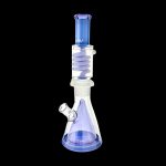 Purple glass bong with percolator, isolated on a black background.