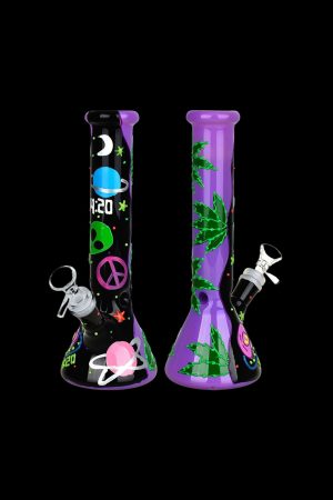 Purple glass bong with cosmic and cannabis-themed decals against a black background.