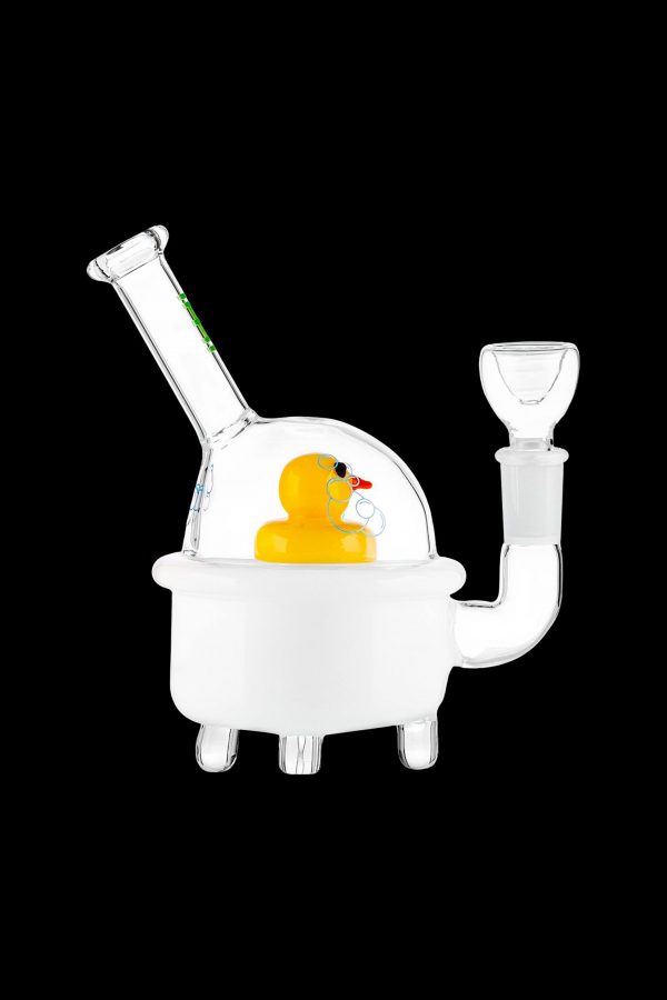 Glass bathtub-shaped water pipe with a rubber duck inside, isolated on a black background.