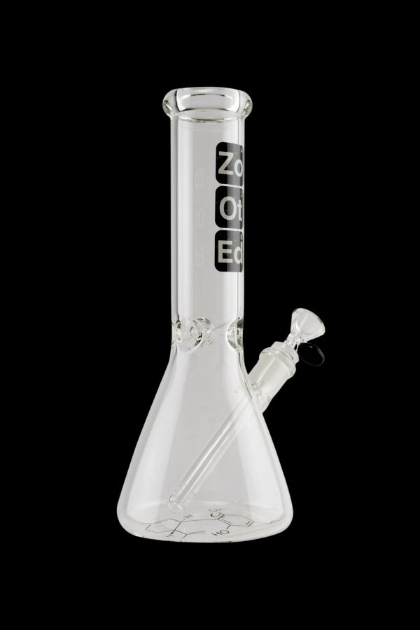 Clear glass bong with branding and intricate etched design.