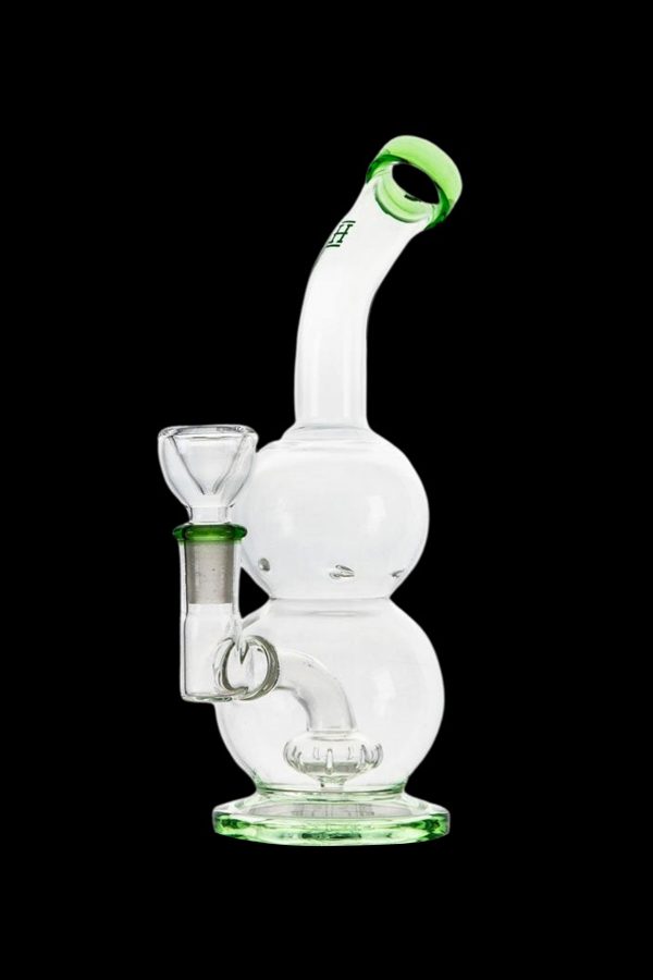 Clear glass bubbler water pipe with green accents.