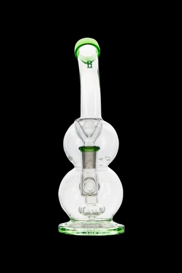 Green-tipped glass bubbler water pipe for cannabis use.