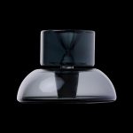 Sleek black cannabis water pipe against a dark background.