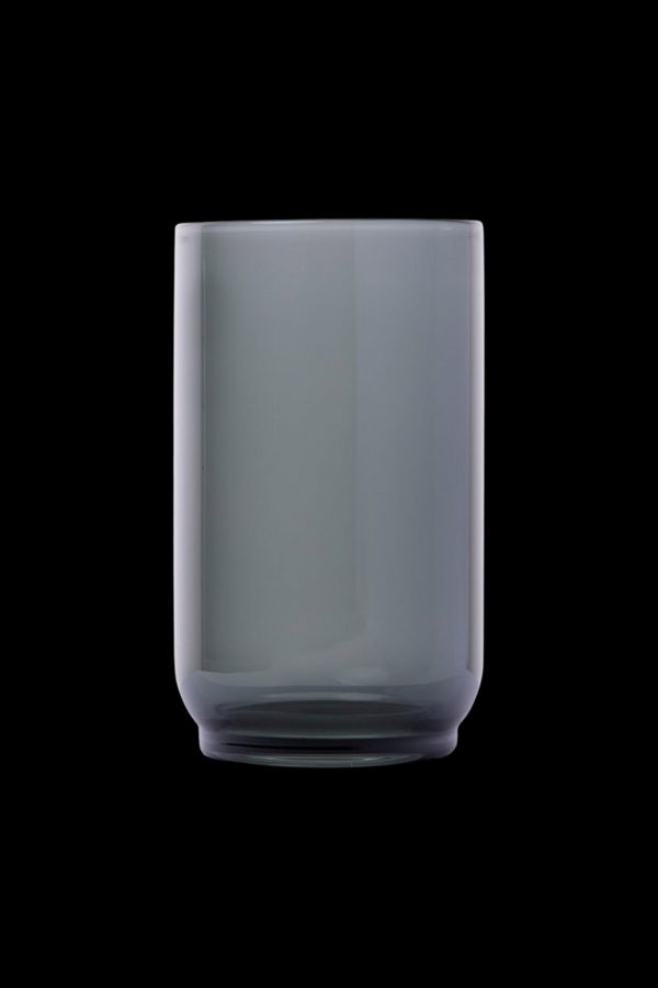 Frosted glass smoking pipe against a black background.