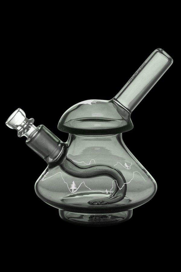 Green glass water pipe with etched mountain landscape design.