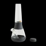 Black silicone bong with a glass chamber and downstem.